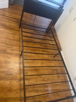 Black Metal Twin Bed Frame with mattress.