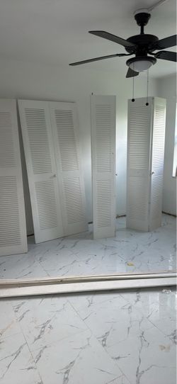 4 Metal bifold doors and 2 interior doors