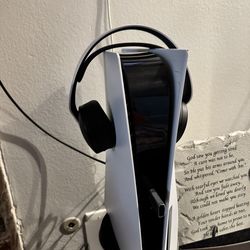 All white PS5 set with headset, controllers, earbuds and portable remote