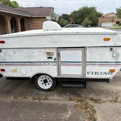 1996 Viking Pop Up trailer in good condition, has stove, sink & ice box, no AC and needs some work