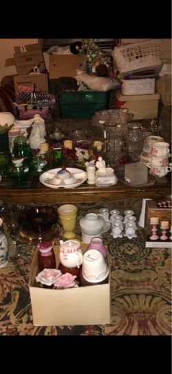 Assorted glassware for repurposing. All colors bowls, vases, cups, plates, platters, etc. All boxed and labeled by glassware type and color. Many boxe