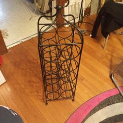 Iron Wine Rack. Holds 10 Bottles.