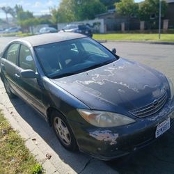 2003 Toyota Camry .. I will have to delete this post and repost tomorrow my inbox is getting flooded with out-of-state spam