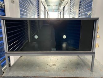 TV stand with cabinet & shelf.