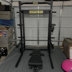 Squat Rack W/ Cups, Spotter Arms And Dip Bar Attachment 