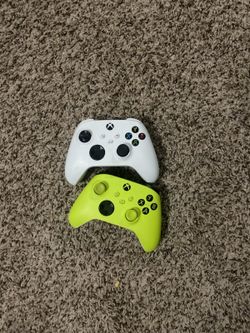 Two Xbox Wireless Controllers White and Green