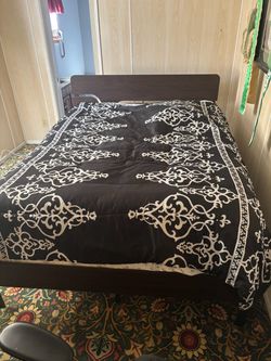 Full size bed. Like new. Barely used.