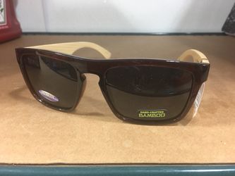 Brand new sunglasses with the wood arms