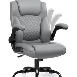 New quality gray faux leather rocking office chair, with armrests that flip up 90°  