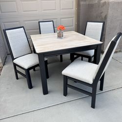 Table With 4 Chairs and  2 extending leaves Available