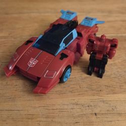 Transformers Autobot Pointblank with mini Autobot Peacemaker