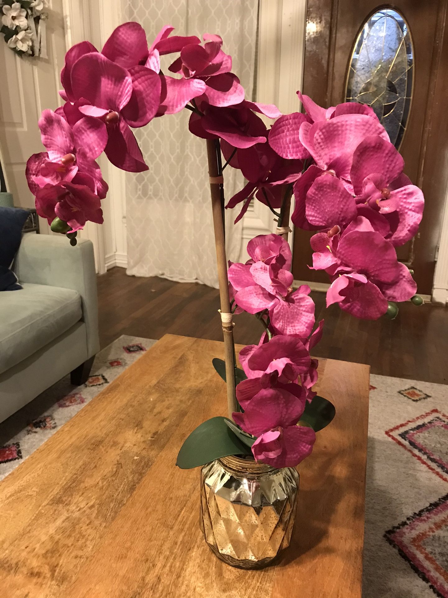 Faux orchid arrangement and flower decor