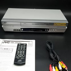 JVC, VCR with Remote Manual and Cable. Works fine.