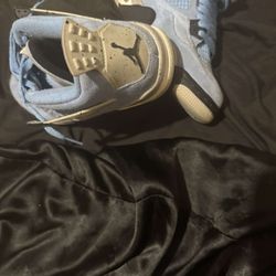 university blue jordan 4s