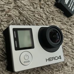 Like new - GoPro Hero4 + All-weather Accessories & More