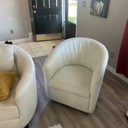 white leather couch in chair 