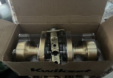 Kwikset Pismo Satin Brass Square Bed Bath Door Knob with Lock Featuring Microban Antimicrobial Protection