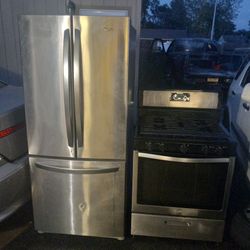 LG Slainlees Bottom Frige And A 5 Burner Stove