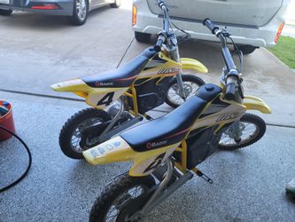 Pair of Razor MX650 Electric Dirt Bikes with Spare Parts