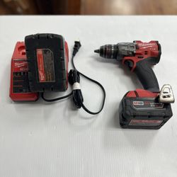 MILWAUKEE 2904-20 HAMMER DRILL IN USED CONDITION, COMES WITH CHARGER AND 2 BATTERIES