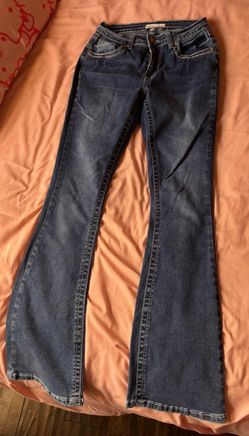 low rise dark washed blue boot cut jeans