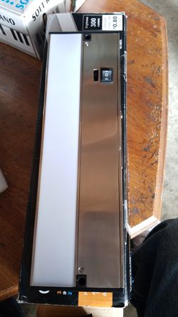 Under cabinet fixture , or shelf