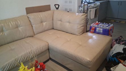 Beige sectional leather sofa