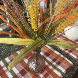 Decorative Vase With Flowers$5