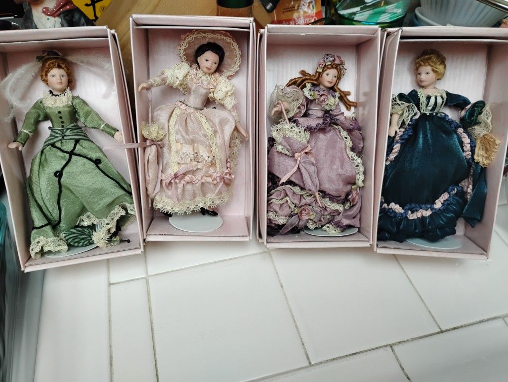 Four Miniature Porcelain Dolls Sold As A Set Only $25