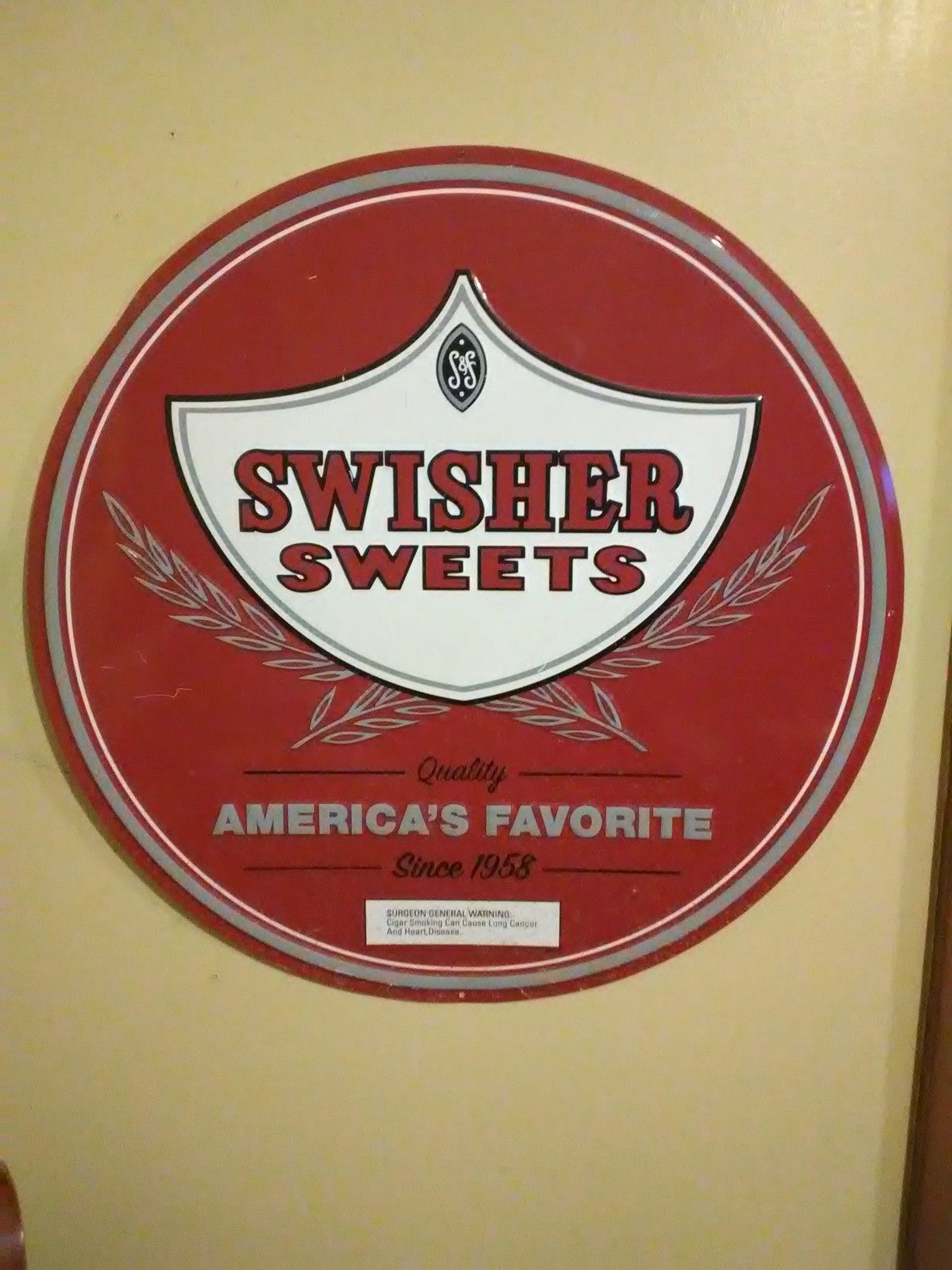 Tin Swisher sign