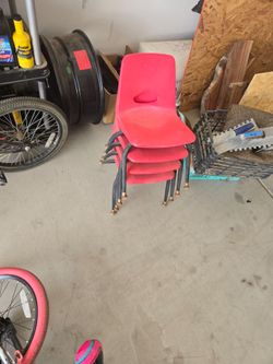 Kids red small school chairs