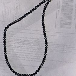 14 karat yellow gold 16 inch black pearls necklace