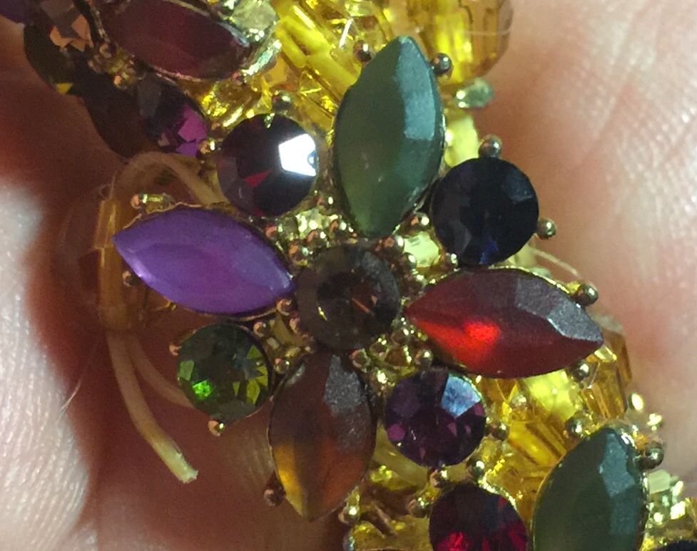 Multiple color stones arranged as flower petals bracelet