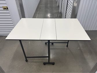 NEW JOANN FABRIC DROP-LEAF WHITE LAMINATE MOBILE CRAFT TABLE PERFECT CONDITION & DELIVERY AVAILABLE