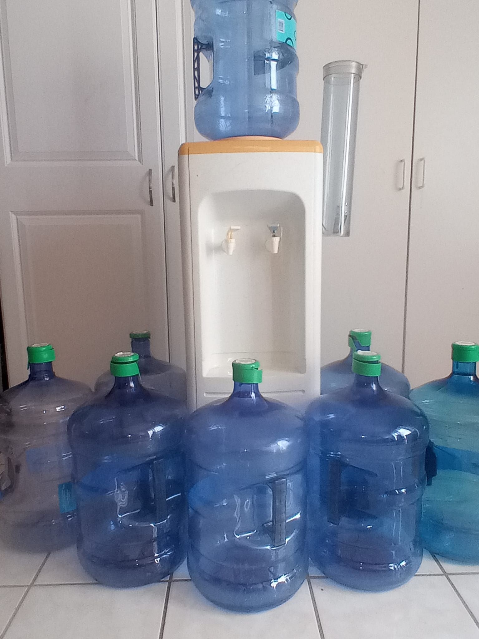 Water cooler & 8 pcs of 5 gallon bottle