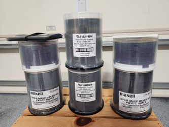 All New Maxell/Fujifilm DVD-R White Inkjet/Thermal Printable Recordable Disc. 4-spindle packs of 100 each and 2-spindle packs of 50 each.