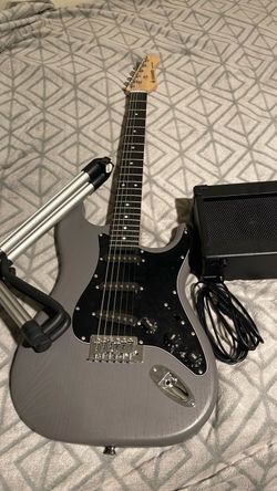 Donner Electric guitar. Amplifier, Cable, And Stand included