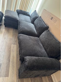Title: Avrylynn 120” Upholstered Cloud Sofa + Ottoman (Wade Logan) — Deep Charcoal