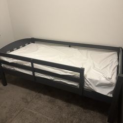 Twin bed with rails