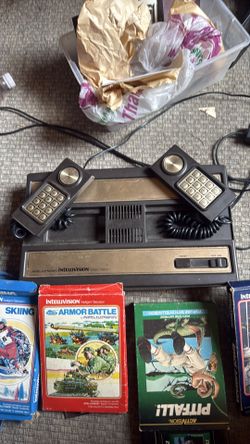 Intellivision video game and 4games with boxes
