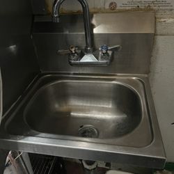 Small Sink And Water Faucet