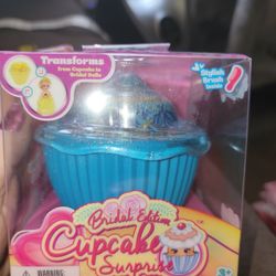 NEW CUP CAKE BRIDAL DOLLS.  EACH SMELL LIKE A DIFFERENT FLAVOR.  SEE ALL PICTURES