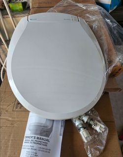 New Brondell L60-RW LumaWarm Heated Toilet Seat, Night Light, 3 Temperatures Gentle Close Lid, Built-In Controls,Round,White. Retails $140 with Taxes
