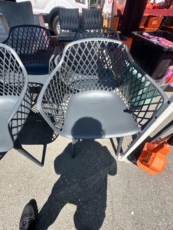 New 4 set of plastic gray chairs $140