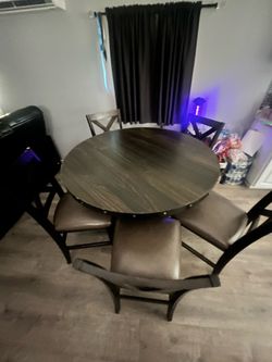 Kitchen table and seats.