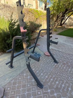 Squat/bench rack plus weights and bar