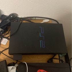 PlayStation 2 With Controllers And Cables 