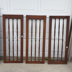 Antique wood and glass cabinet doors 1933