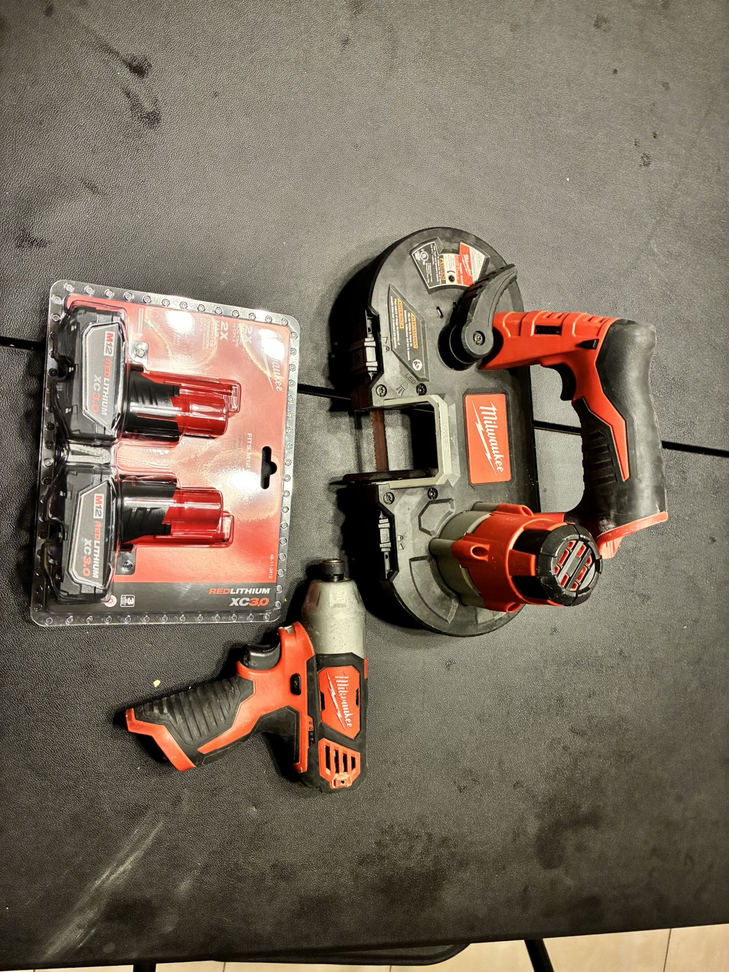 Milwaukee M12 Bandsaw/ Impact Drill w/ Brand New Battery Packs