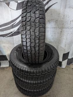 LT 245/75r16 "Near Brand New" Cooper Discoverer Snow Claw Load "E" studded winter snow tires